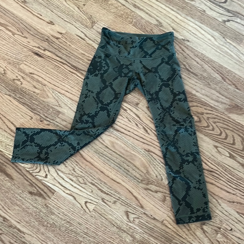 Lululemon leggings. Snake skin look. Worn. No holes